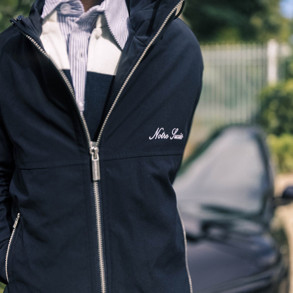 Heritage Winter Jacket logo and full silver zip, worn open